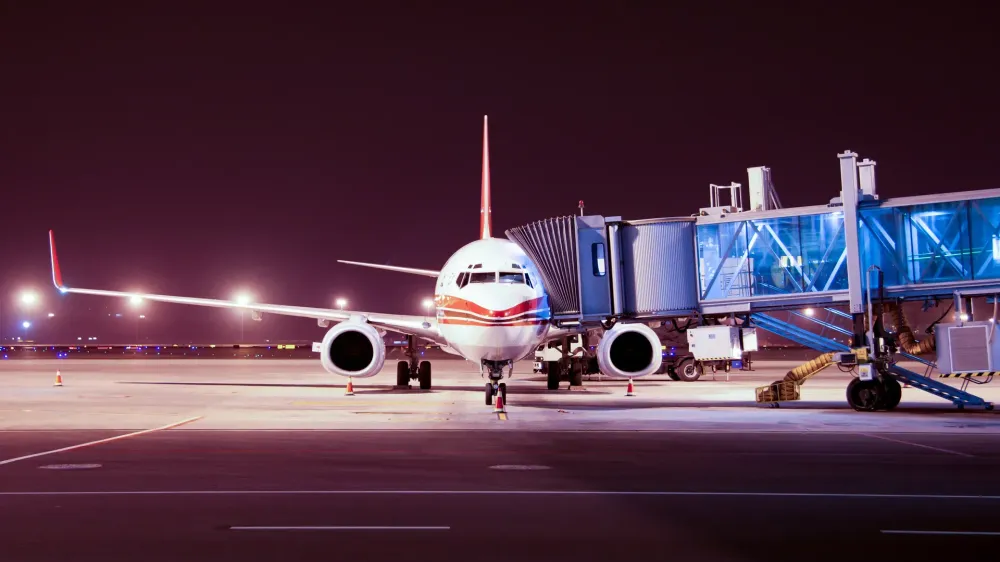 airplane boarding at night
